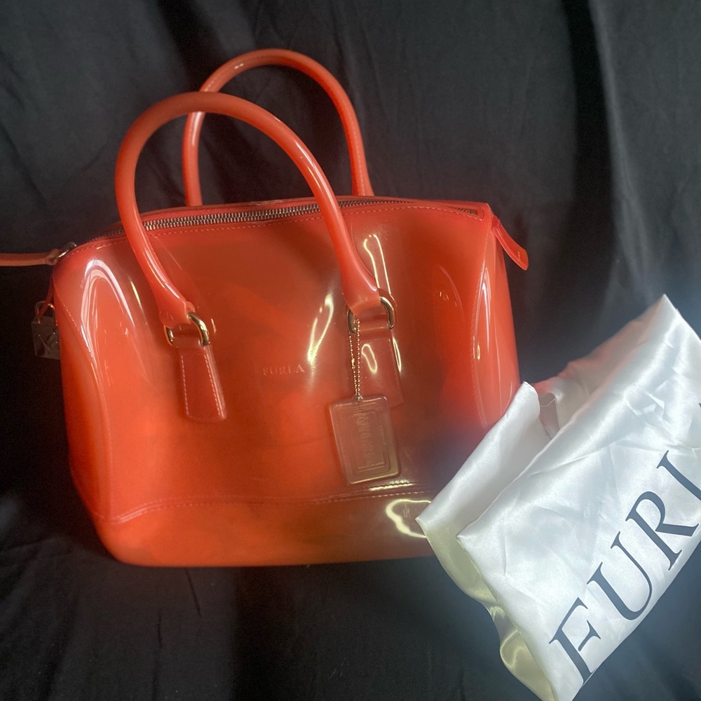 Authentic Furla Candy Bag. Comes with protective drawstring bag.